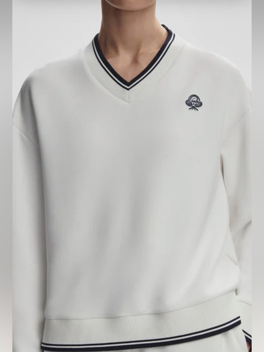 Varley White V-Neck Sweater with Navy Trim and Embroidered Logo